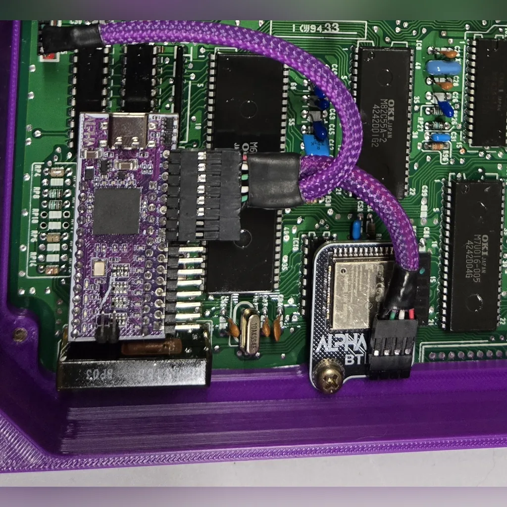 ALPHA BT module installed on an OBD1 Honda ECU board, connected to the ALPHA NextGEN emulator with the purple sleeved ALPHA harness. ECU and emulator not included